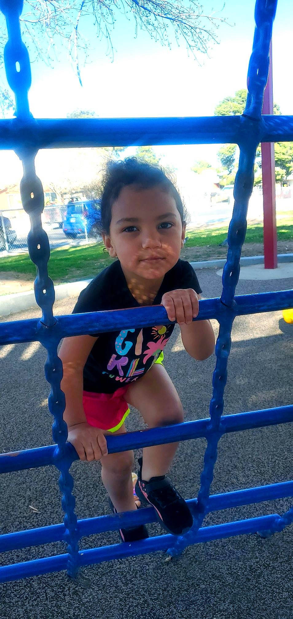 Aaliyah joined the competition — help win amazing prizes! baby_toddler_clothing, black, blue, city, electric_blue, facial_expression, fun, happy, leisure, outdoor_play_equipment, person, plant, playground, public_space, recreation, shorts, sky, smile, toddler, tree