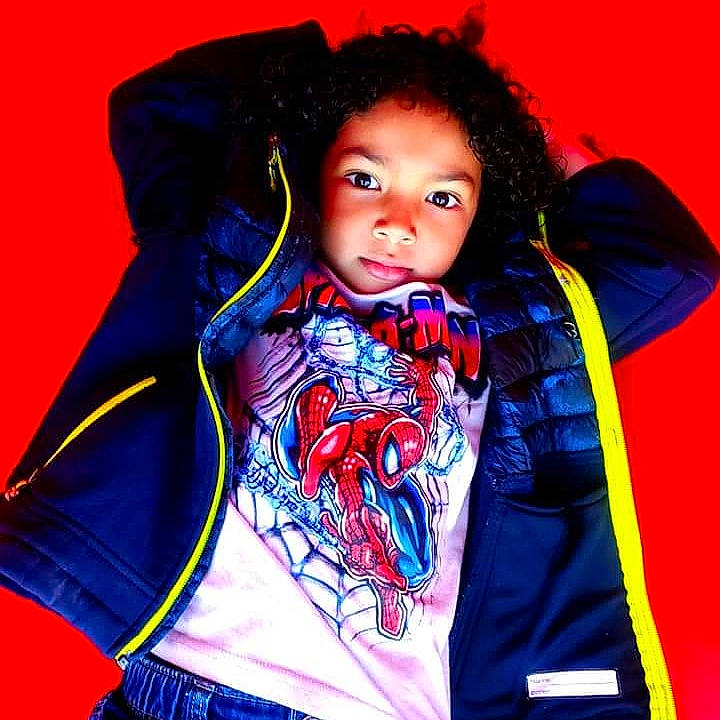 Adriel joined the competition — help win amazing prizes! black_hair, cool, denim, electric_blue, entertainment, fashion_accessory, fashion_design, fictional_character, flash_photography, fun, hood, jersey, magenta, outerwear, person, personal_protective_equipment, sleeve, sportswear, street_fashion, t_shirt