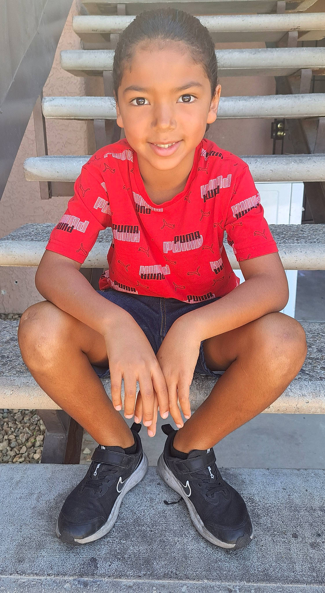 Adriel is registered to the contest to win money with this photo: chin, face, fun, happy, human_leg, joint, joy, knee, leg, leisure, lip, neck, person, shoe, shorts, sleeve, smile, sneakers, sportswear, thigh