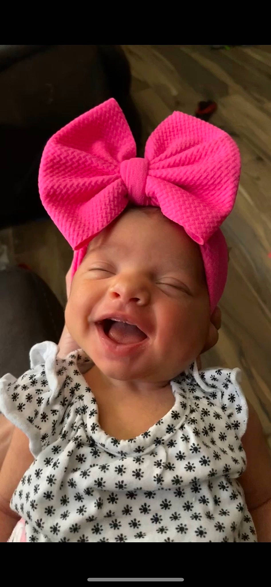 Elora is registered to the contest to win money with this photo: baby, baby_laughing, baby_toddler_clothing, cap, cheek, child, clothing, ear, eyebrow, happy, head, headgear, headwear, lip, mouth, nose, person, pink, sleeve, smile