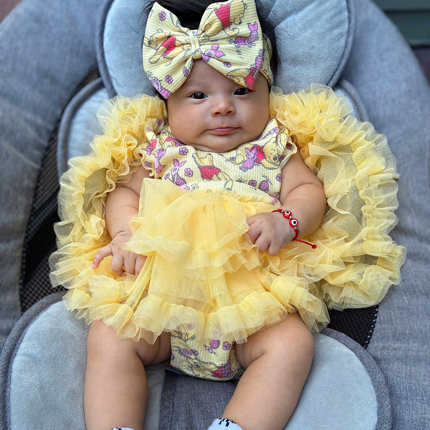 Stephanie joined the competition — help win amazing prizes! adorable, baby, bracelet, child, clothing, cushion, cute, dress, face, hands, headband, indoor, infant, legs, panda, portrait, ruffles, seat, socks, yellow