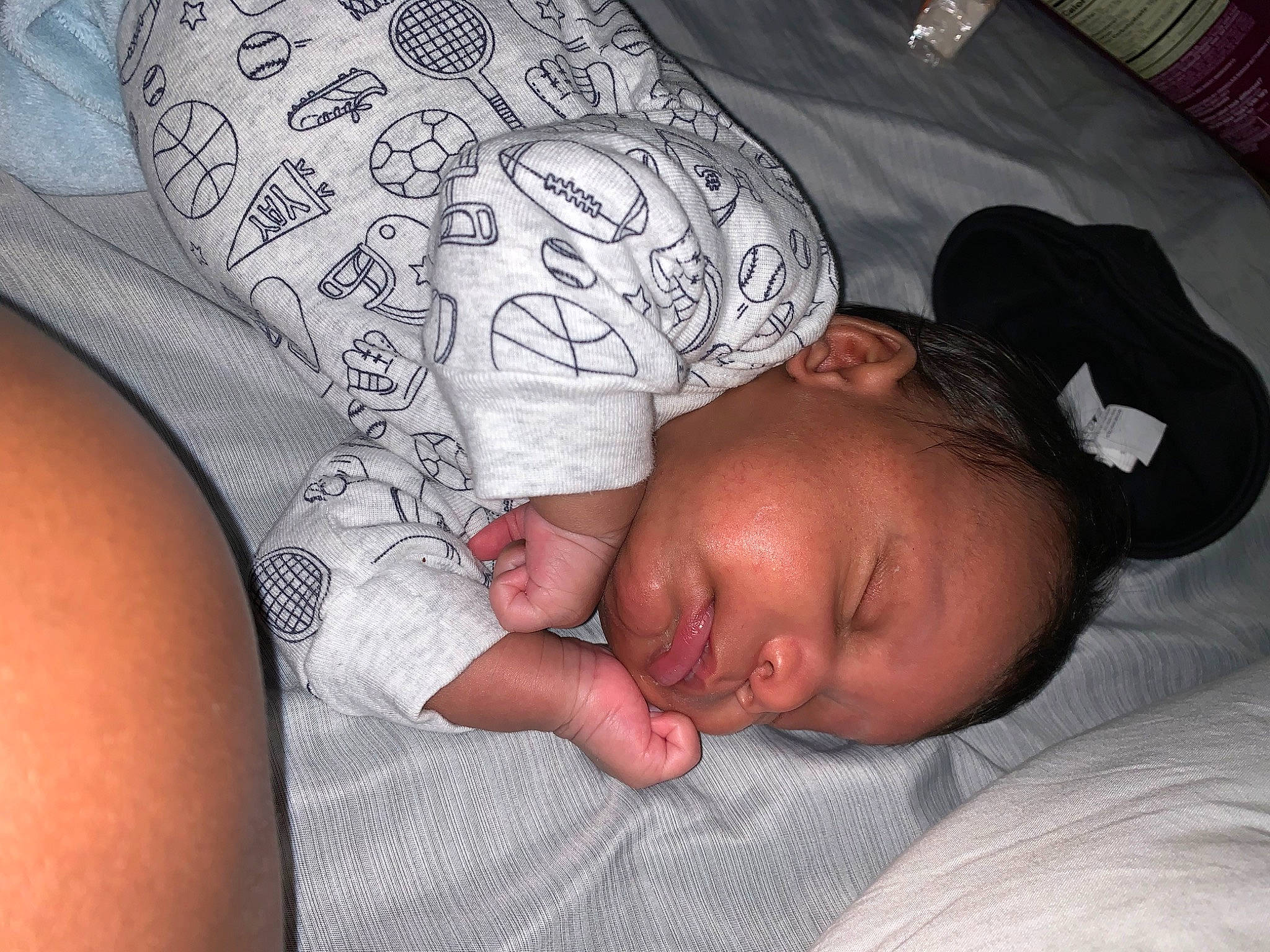 Keon is registered to the contest to win money with this photo: arm, baby, bedtime, birth, child, flesh, hand, muscle, nap, person, sleep