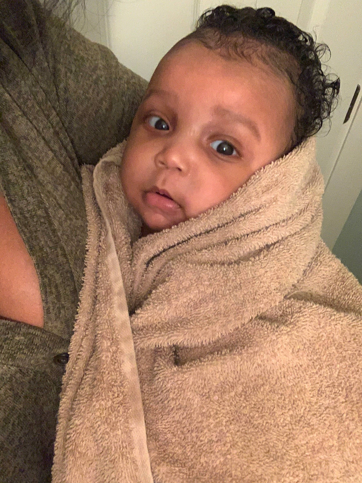 Keon is registered to the contest to win money with this photo: baby, black_hair, cheek, child, chin, eye, eyebrow, face, forehead, hair, head, lip, neck, nose, outerwear, person, selfie, skin