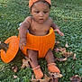 baby, pumpkin, grass, autumn, fall_leaves, knit_hat, knit_booties, outdoor, child, cute, nature, seasonal, orange, sitting, leaf_litter, baby_boy, costume, holiday, harvest, playful