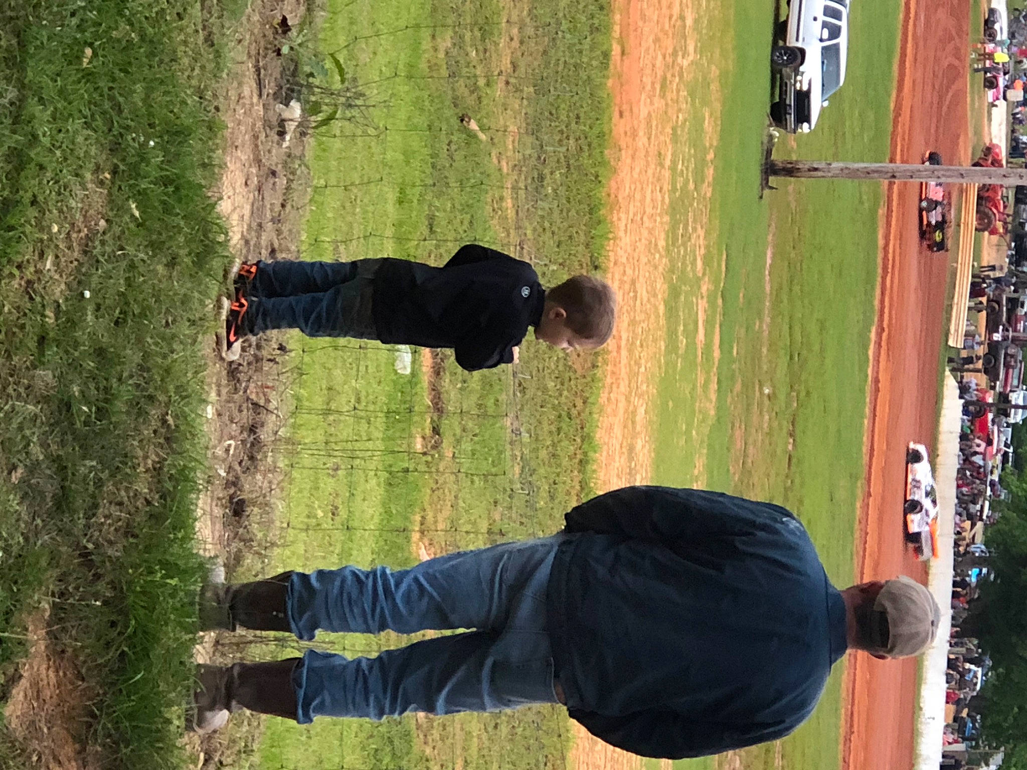 Jaxson is registered to the contest to win money with this photo: black, clothing, elbow, fun, grass, grass_family, green, joint, knee, leisure, light, people_in_nature, person, photograph, plant, recreation, shadow, snapshot, sports, tree