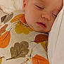 Jaxson is registered to the contest to win money with this photo: baby, bed, bedroom, blanket, bodypart, cushion, face, finger, furniture, hand, head, homedecor, indoors, linen, newborn, person, photography, portrait, quilt, sleeping