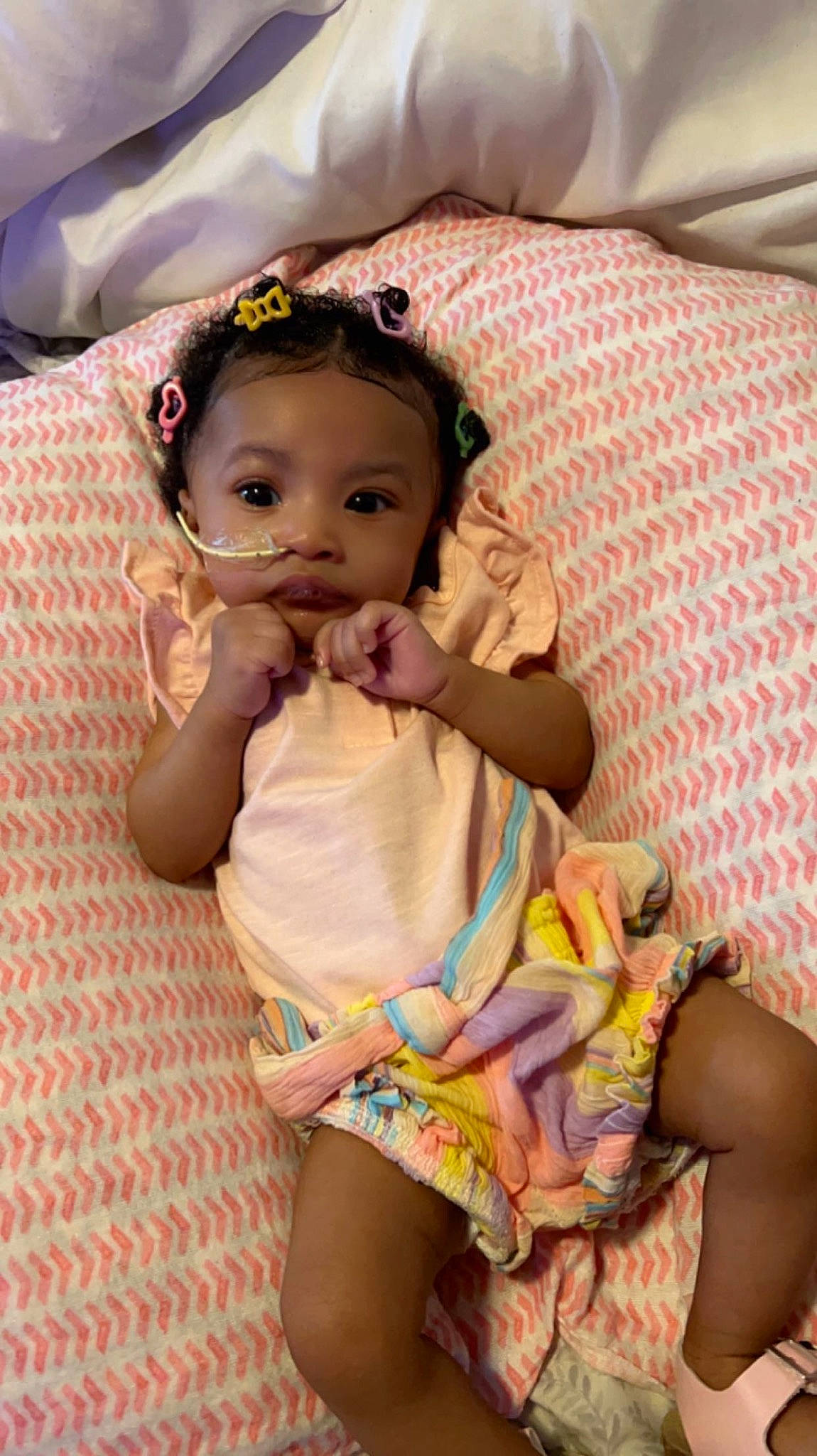 Wynter is registered to the contest to win money with this photo: abdomen, baby, baby_toddler_clothing, black_hair, cheek, chin, eye, eyelash, hair, happy, head, iris, lip, mouth, neck, person, pink, skin, textile, toddler