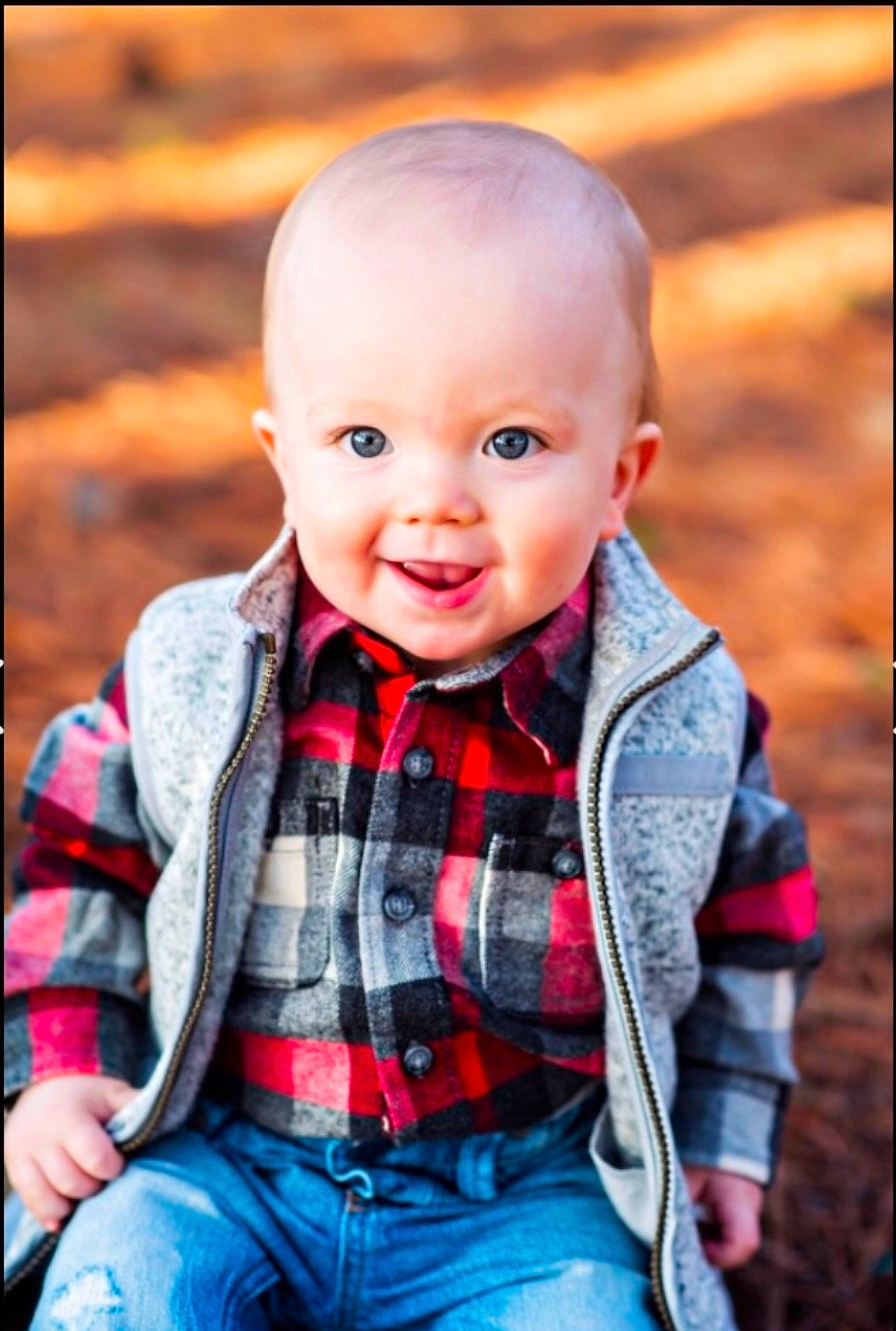 Hayes is registered to the contest to win money with this photo: boy, cheek, child, child_model, fun, infant, joy, outerwear, pattern, people, person, photograph, photography, plaid, portrait, portrait_photography, skin, smile, toddler