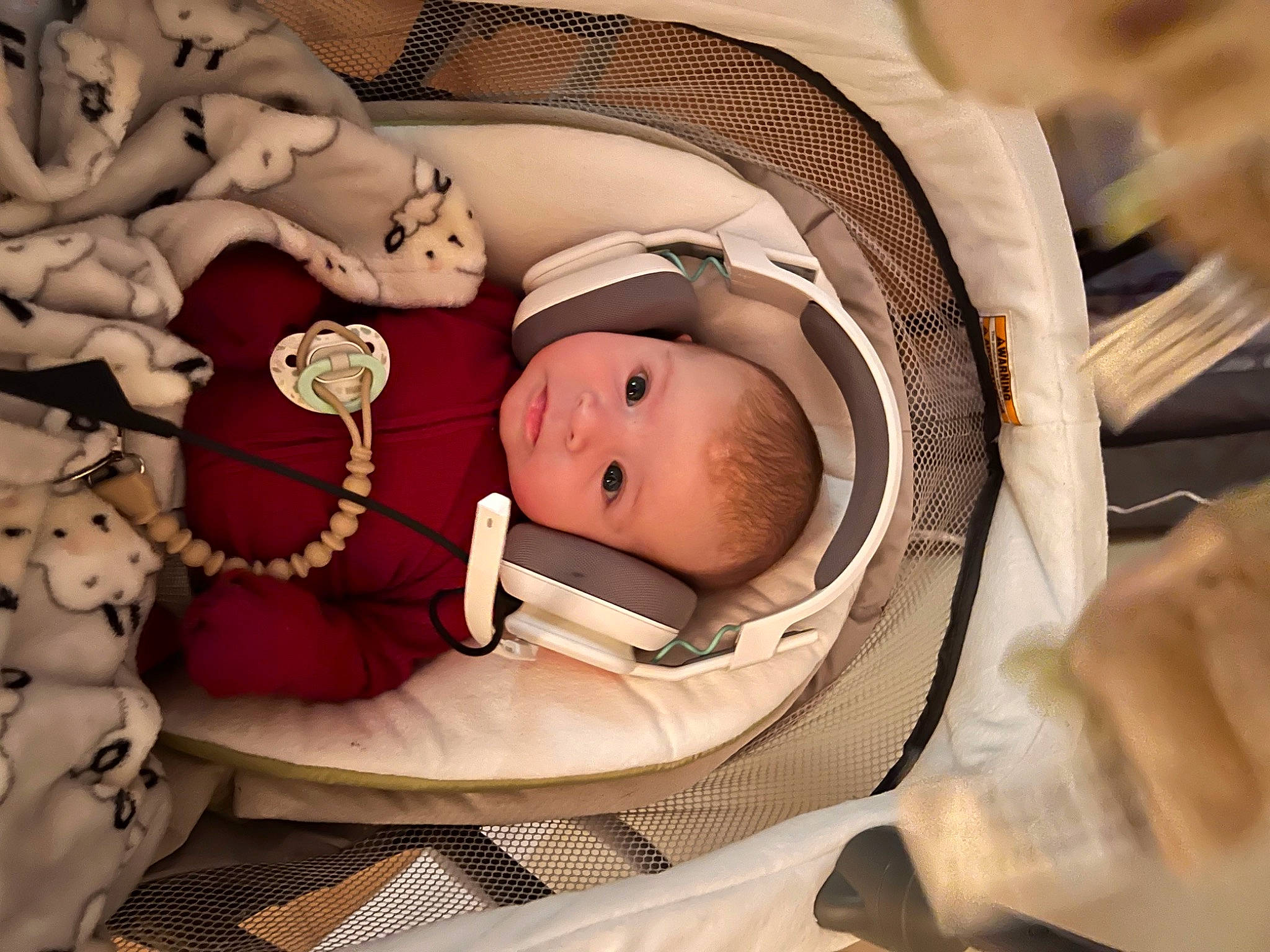 Elijah is registered to the contest to win money with this photo: baby, baby_products, baby_safety, baby_sleeping, baby_toddler_clothing, bedtime, carmine, child, comfort, infant_bed, linens, nap, person, room, skin, sleep, textile, toddler