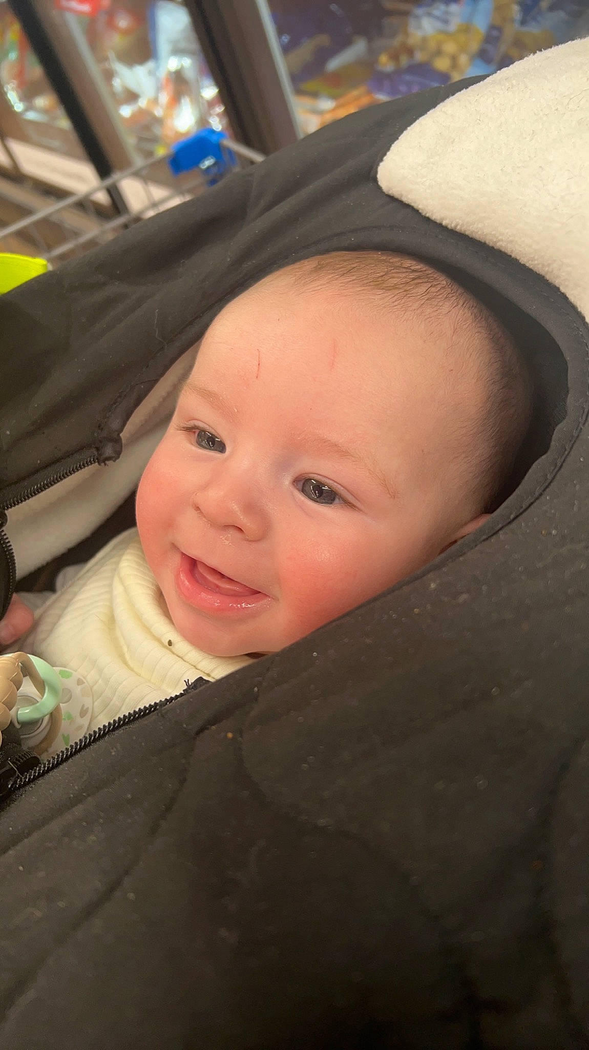 Elijah is registered to the contest to win money with this photo: baby, baby_carriage, baby_products, baby_toddler_clothing, cheek, child, comfort, eyebrow, eyelash, fun, happy, nose, person, sitting, skin, smile, toddler, tree