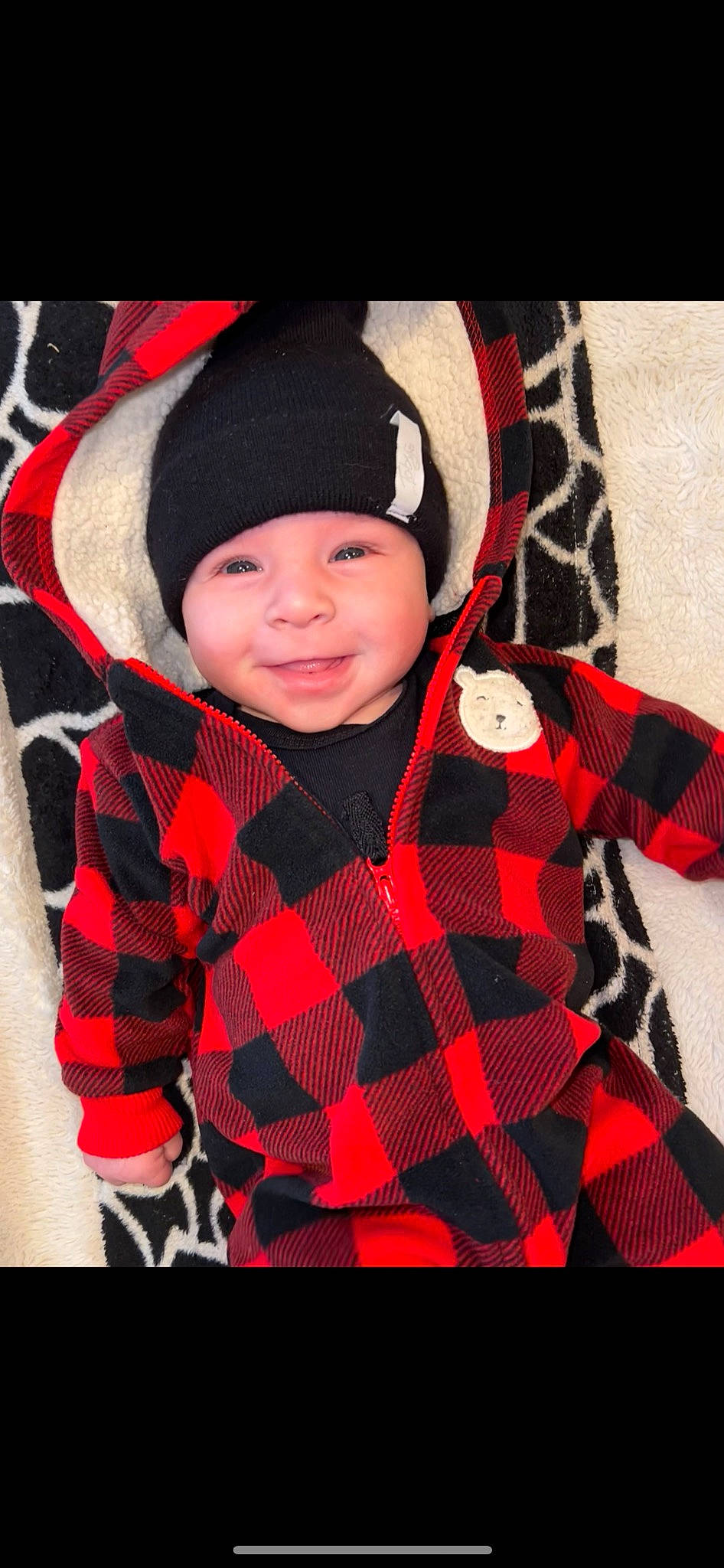Elijah joined the competition — help win amazing prizes! baby, baby_toddler_clothing, beanie, carmine, child, collar, fur, happy, headwear, hood, magenta, outerwear, pattern, person, photograph, plaid, polar_fleece, sleeve, smile, tartan
