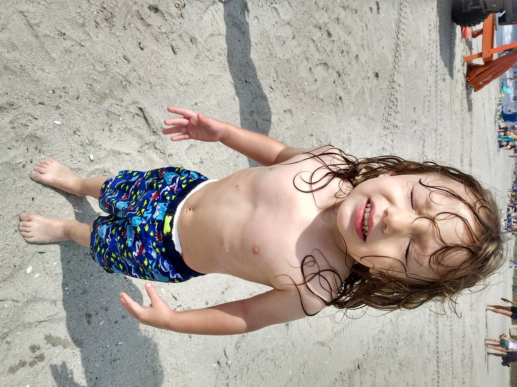 James is registered to the contest to win money with this photo: abdomen, arm, barefoot, black_hair, brassiere, calf, chest, dress, elbow, eyewear, foot, fun, glasses, human_leg, person, sunglasses, swimwear, thigh, tree, trunk