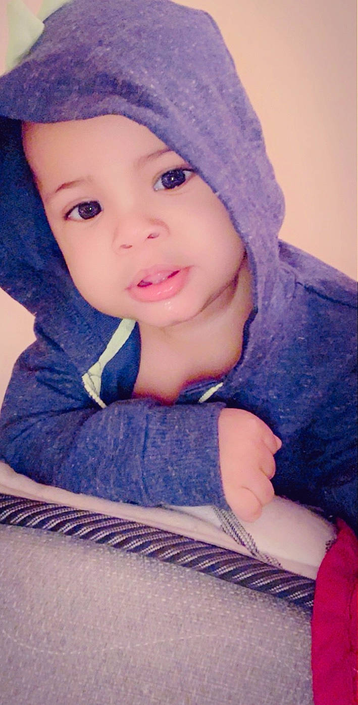 Jamarion is registered to the contest to win money with this photo: baby, beauty, cheek, child, child_model, cool, eye, eyebrow, headgear, knit_cap, lip, nose, person, skin, smile, toddler