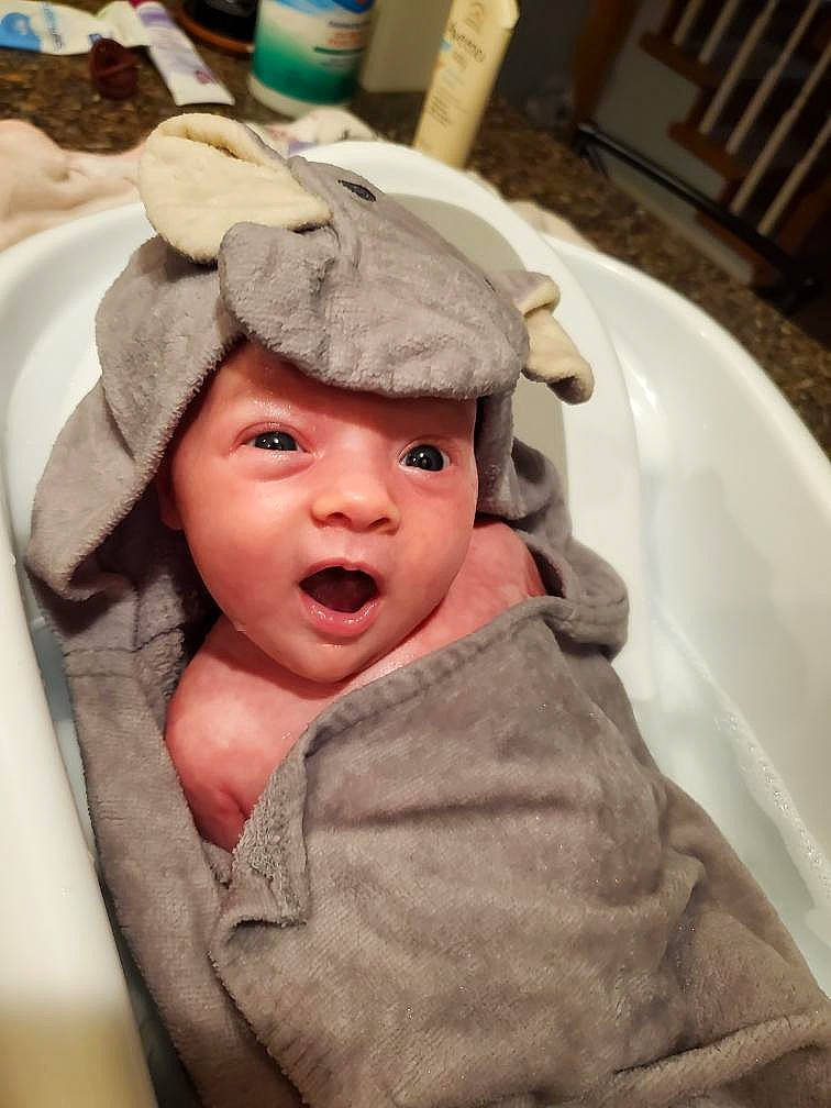 Kaitlyn is registered to the contest to win money with this photo: baby, baby_toddler_clothing, cap, cheek, child, comfort, eye, face, fashion_accessory, fun, happy, headgear, headwear, hood, mouth, nose, person, skin, sleeve, toddler