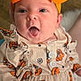 Everleigh joined the competition — help win amazing prizes! apparel, baby, child, closeup, clothing, cute, expression, fabric, face, hand, happy, headwear, indoors, infant, newborn, orange_bow, person, portrait, pumpkin_pattern, skin