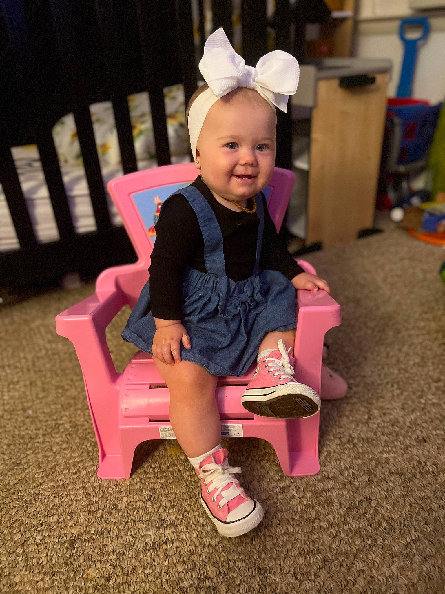 Oakleigh is registered to the contest to win money with this photo: baby, baby_toddler_clothing, chair, child, costume_hat, event, face, fun, happy, joy, knee, lap, magenta, person, pink, shorts, sitting, sleeve, smile, sock