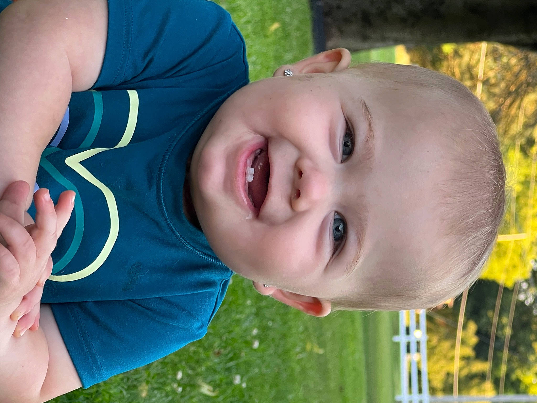 Oakleigh is registered to the contest to win money with this photo: blue, cheek, chin, eye, face, hand, happy, head, human_body, joy, light, lip, mouth, nose, people_in_nature, person, photograph, plant, skin, smile