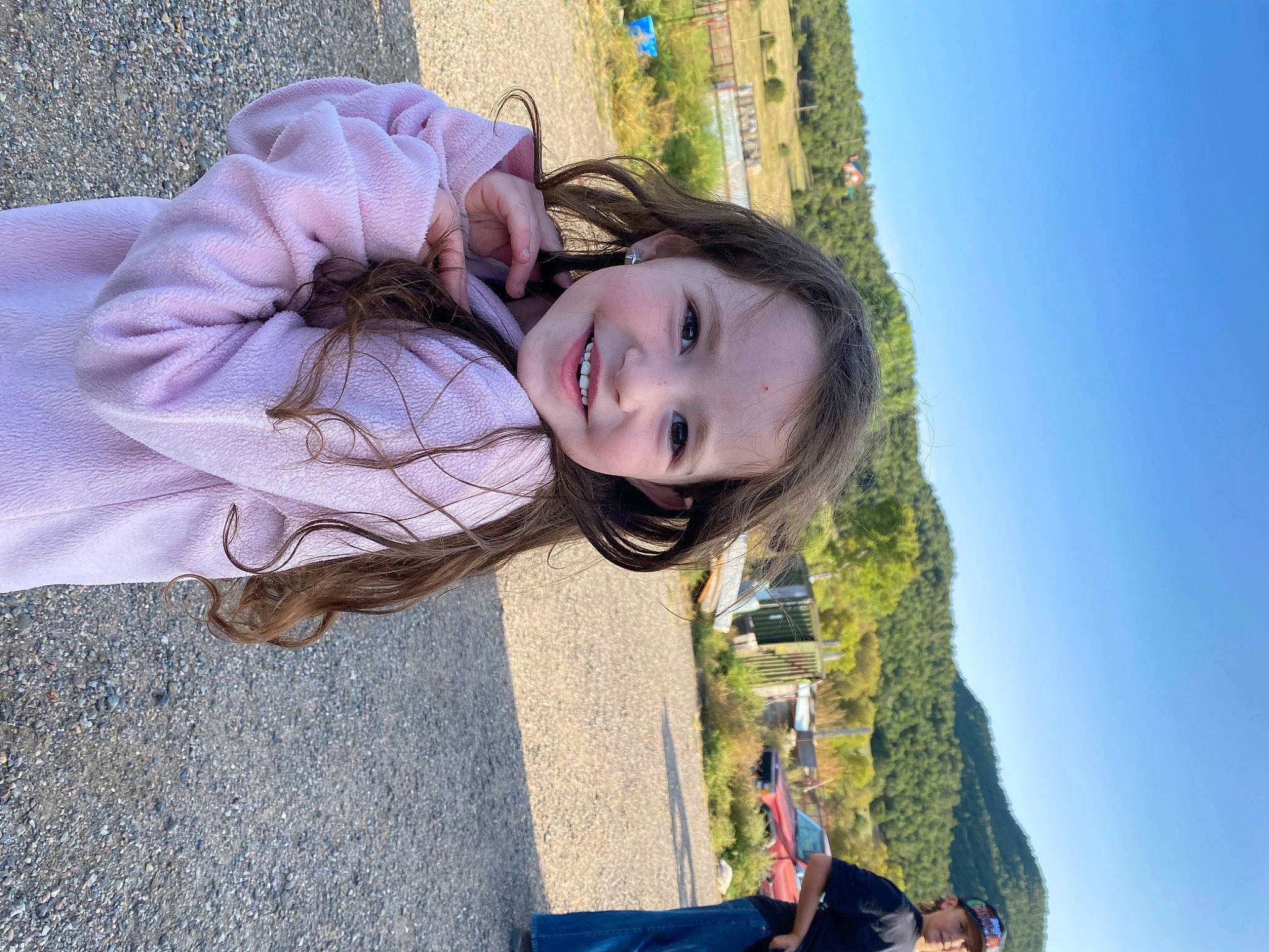 Cheyenne is registered to the contest to win money with this photo: blue, child, flash_photography, fun, grass, happy, headwear, joy, landscape, leisure, people_in_nature, person, plant, portrait_photography, recreation, sitting, sky, toddler, tourism, travel