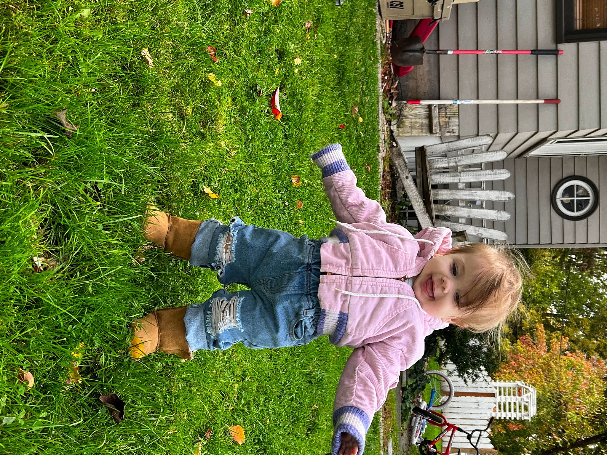 Jillian is registered to the contest to win money with this photo: baby, child, door, fun, garden, grass, green, groundcover, happy, joy, lawn, leaf, leisure, people_in_nature, person, plant, play, recreation, shrub, sitting