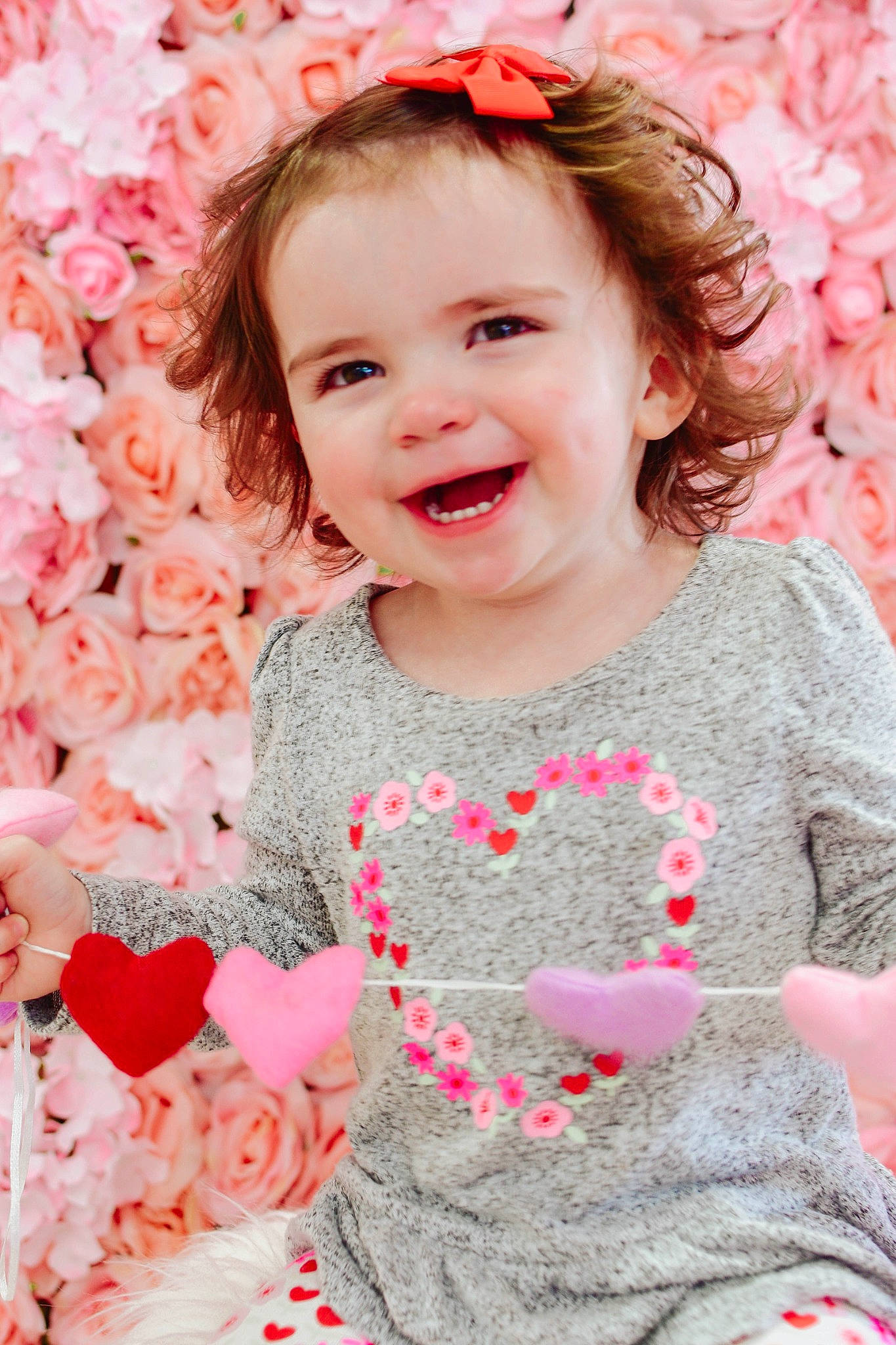Evelyn joined the competition — help win amazing prizes! baby_toddler_clothing, cheek, clothing, dress, eye, face, facial_expression, happy, head, joy, lip, organ, outerwear, person, photograph, pink, plant, skin, sleeve, smile