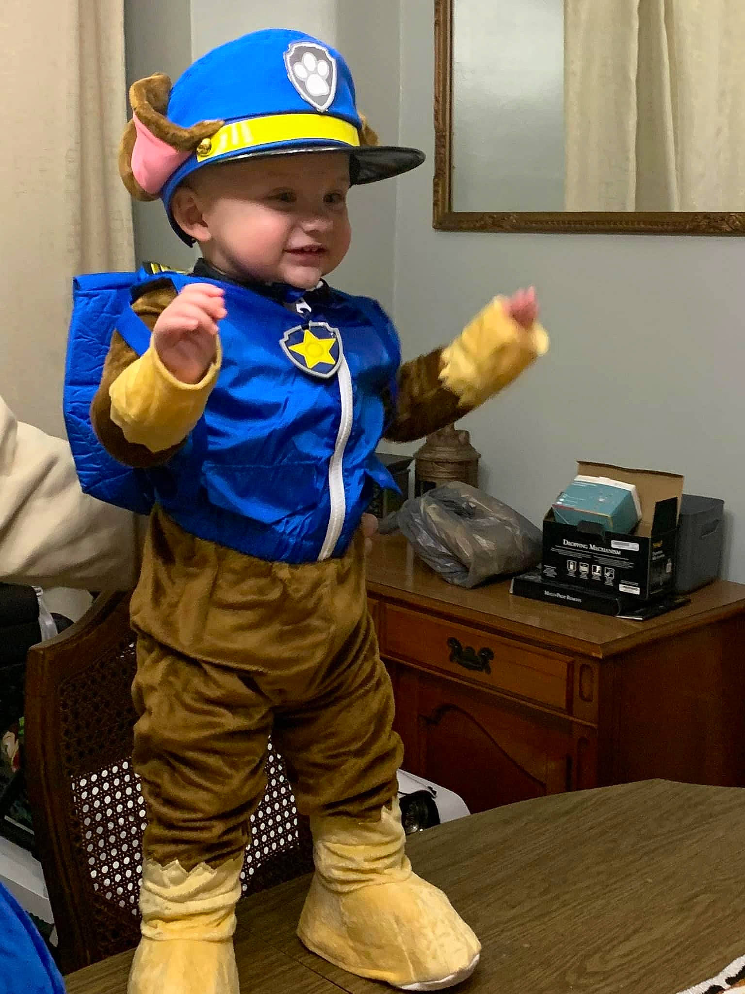 Brintley joined the competition — help win amazing prizes! baby, bag, cabinetry, chest_of_drawers, child, costume, curtain, drawer, electric_blue, fictional_character, fun, headwear, overall, person, personal_protective_equipment, room, sitting, table, toddler, window