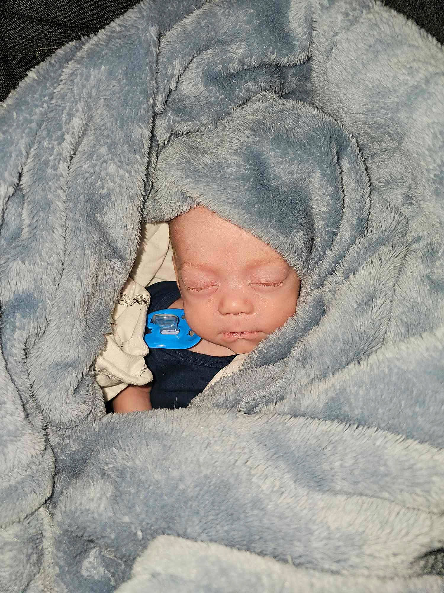 Mathew joined the competition — help win amazing prizes! baby, beanie, child, comfort, electric_blue, freezing, fur, grass, grey, headwear, hoodie, landscape, linens, person, portrait_photography, rock, sitting, toddler, tree, winter