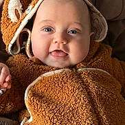 Mathias a rejoint le concours — aidez-le/la à gagner de superbes lots ! baby, infant, smiling, hoodie, fur_clothing, cute, child, face, blue_eyes, closeup, cozy, warm_clothing, soft_texture, indoors, portrait, happy, small_hand, baby_clothes, animal_ears, toddler