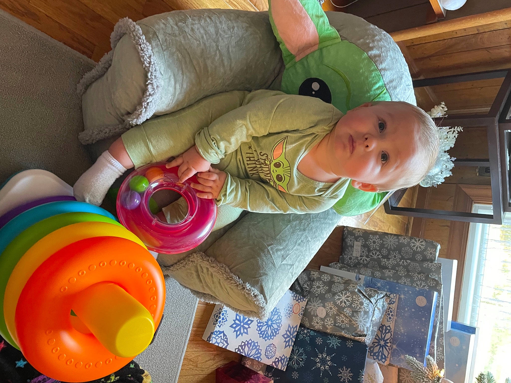 Gustavo is registered to the contest to win money with this photo: baby, baby_products, baby_toddler_clothing, child, comfort, event, fedora, fun, hat, headgear, party_supply, person, plant, plastic, play, room, sitting, sun_hat, toddler, toy