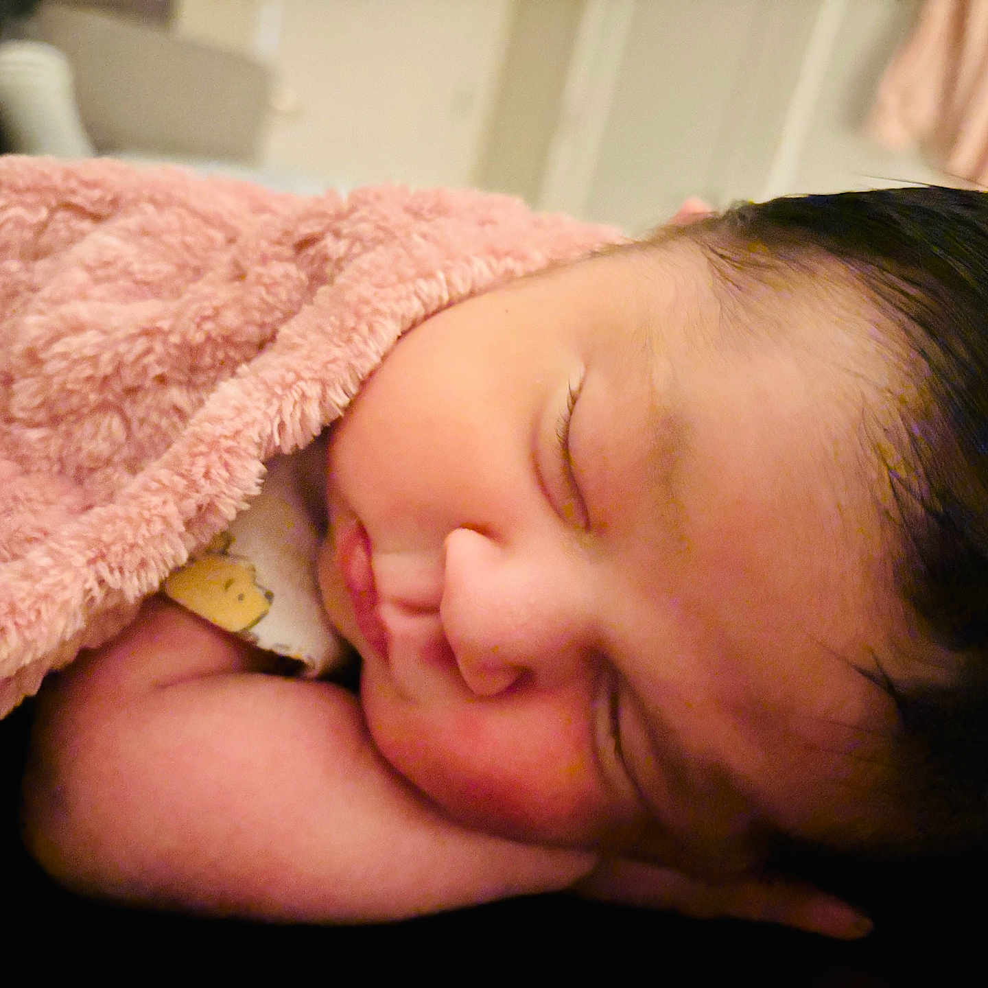 Camila Victoria is registered to the contest to win money with this photo: arm, baby, blanket, cheek, closed_eyes, closeup, cozy, dark_hair, indoor, infant, newborn, nursery, onesie, peaceful, pink_blanket, portrait, resting, skin, sleeping, soft_texture