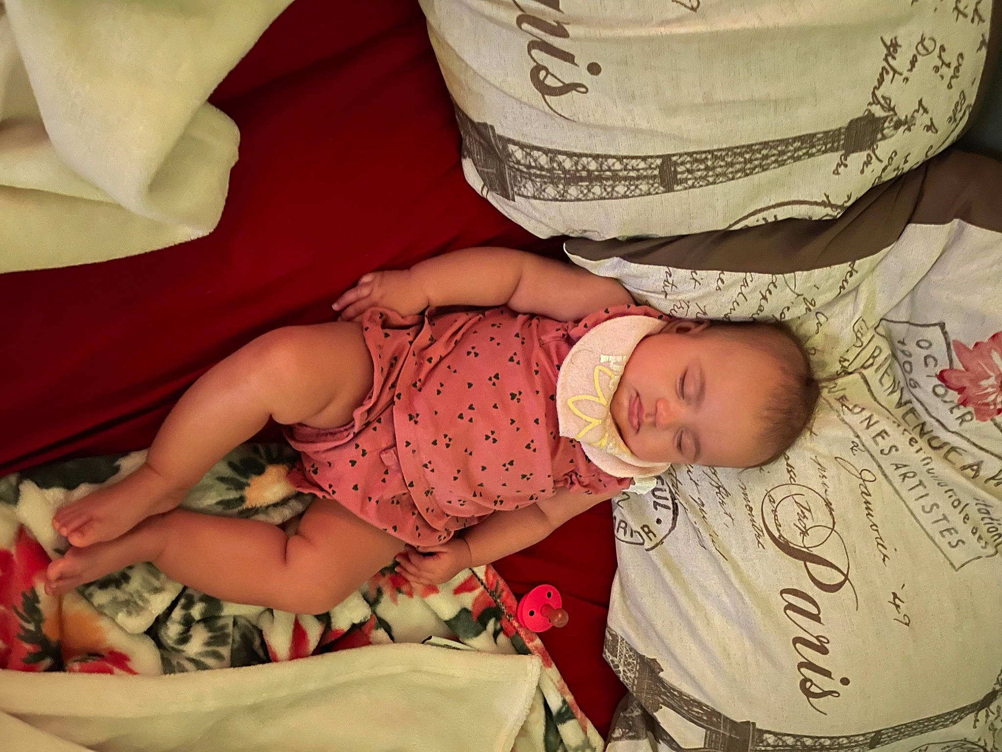 Demi is registered to the contest to win money with this photo: arm, baby, comfort, eye, facial_expression, fashion, finger, hand, head, human, human_body, joint, mammal, muscle, organ, person, product, skin, sleeve, textile