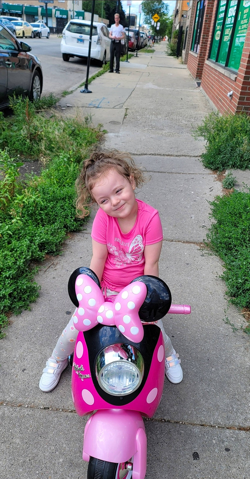 Hailey Jane joined the competition — help win amazing prizes! car, child, city, face, female, girl, head, machine, motorcycle, path, person, photography, portrait, road, sidewalk, street, transportation, urban, vehicle, wheel