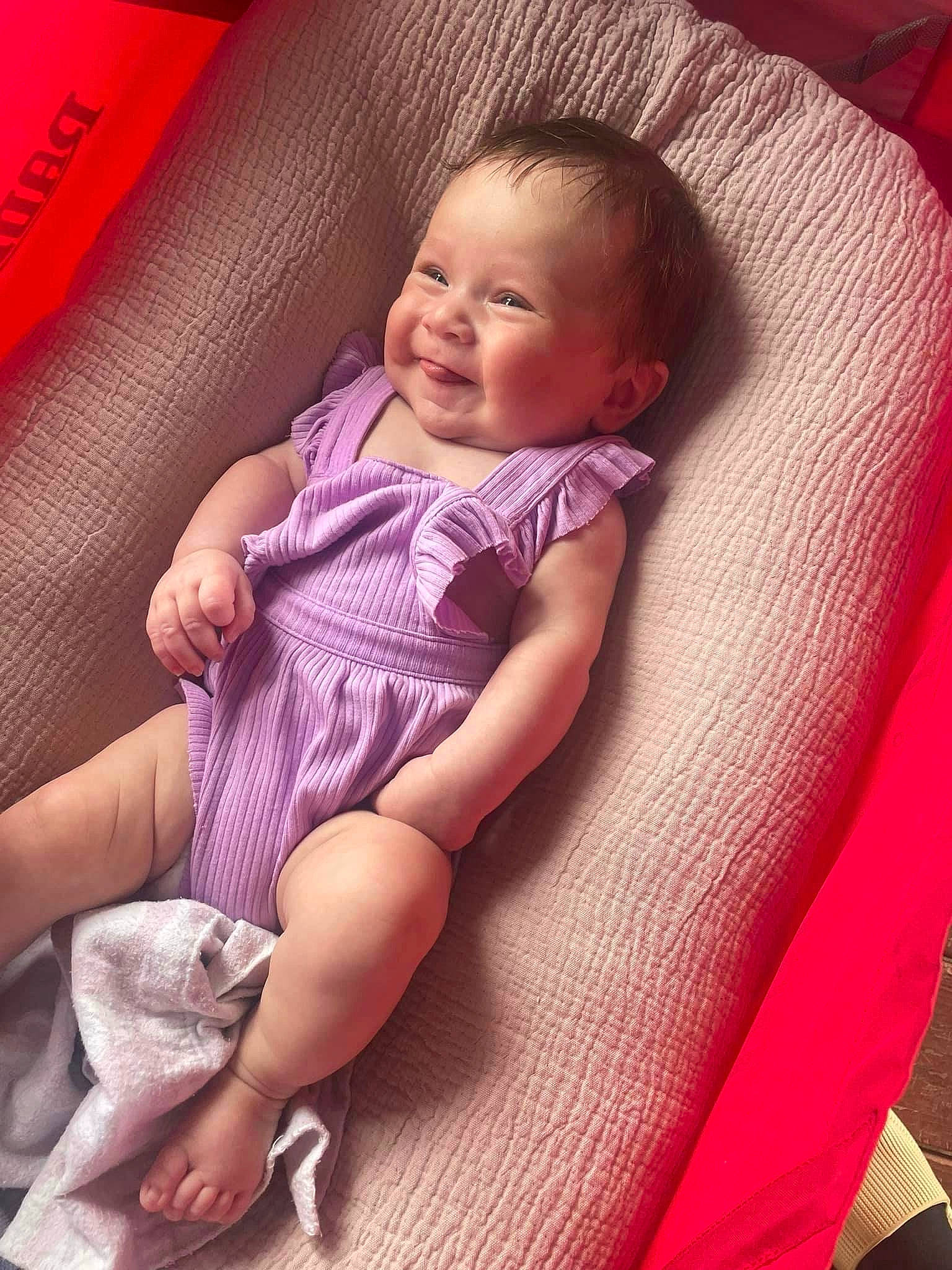 Karter joined the competition — help win amazing prizes! arm, baby_toddler_clothing, comfort, eye, finger, hand, head, human_body, lap, leg, mouth, person, pink, product, purple, skin, sleeve, smile, thigh, toddler