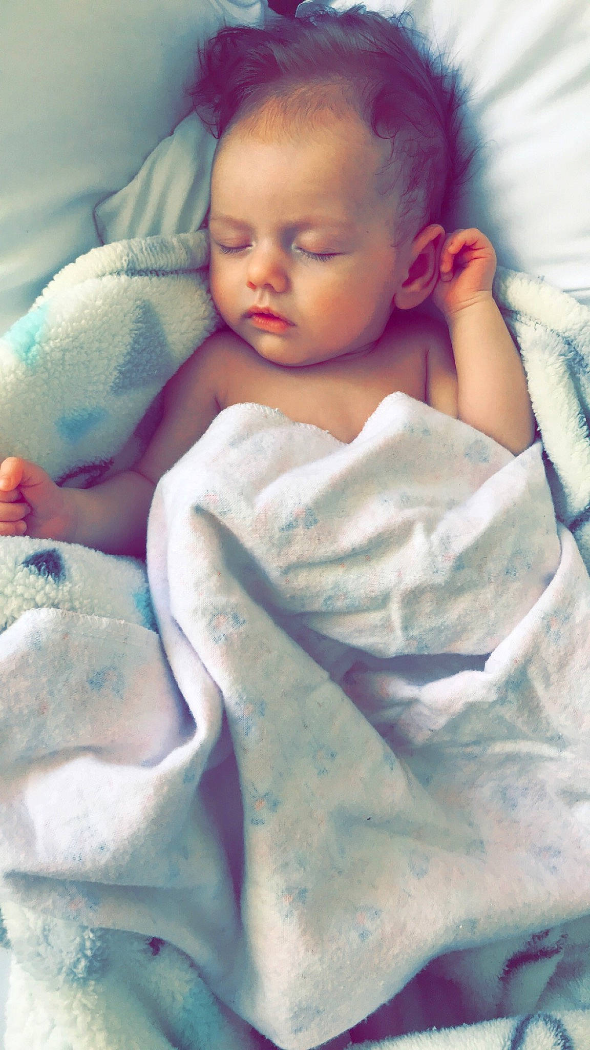 Loretta is registered to the contest to win money with this photo: baby, bedtime, blanket, cheek, child, forehead, linens, nap, nose, person, portrait, skin, sleep, textile, toddler