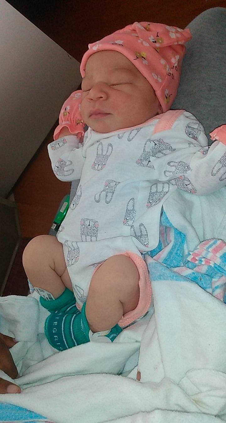 Patience joined the competition — help win amazing prizes! arm, baby, baby_toddler_clothing, cheek, child, comfort, eye, face, facial_expression, finger, hand, hat, human_body, leg, lip, mouth, person, pink, skin, toddler