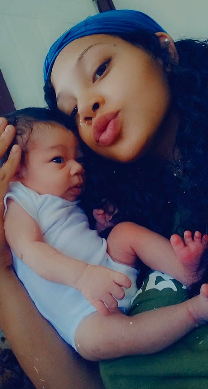 Patience is registered to the contest to win money with this photo: azure, blue, cap, cheek, eye, facial_expression, finger, gesture, hairstyle, hand, happy, iris, lip, mammal, mouth, nose, organ, person, photograph, skin