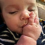Jaxson joined the competition — help win amazing prizes! baby, infant, sleeping, close_up, face, hand, fingers, chubby_cheeks, striped_clothing, peaceful, skin, eyelashes, nose, mouth, cute, child, portrait, indoors, resting, soft_light