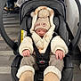 baby, car_seat, winter_clothing, beanie, sleeping, infant, cozy, warm, socks, straps, indoor, flooring, jacket, child, cute, toddler, headwear, hands, padded, comfort