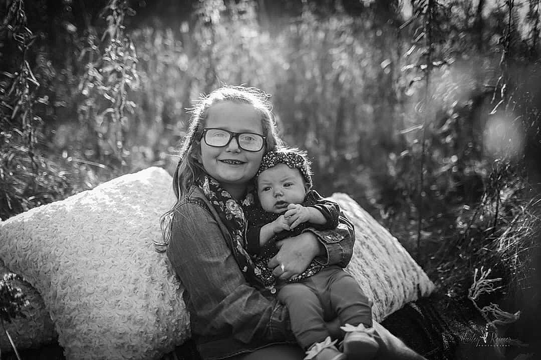 Natalee is registered to the contest to win money with this photo: black, black_and_white, child, fun, grass, happy, leaf, love, monochrome, monochrome_photography, people, people_in_nature, person, photograph, photography, portrait, portrait_photography, smile, snapshot, stock_photography
