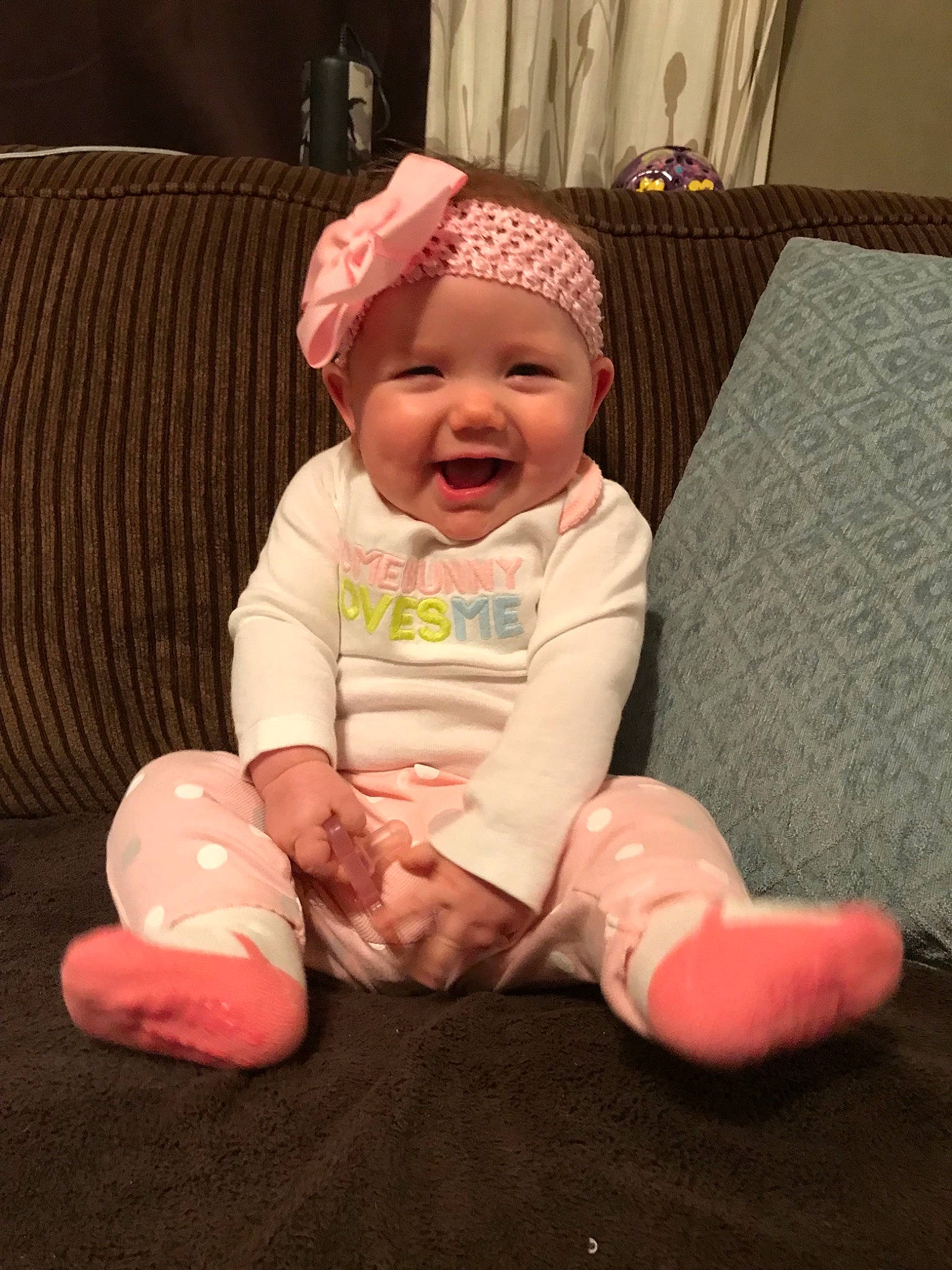 Aubree is registered to the contest to win money with this photo: baby, baby_toddler_clothing, child, person, pink, sitting, toddler