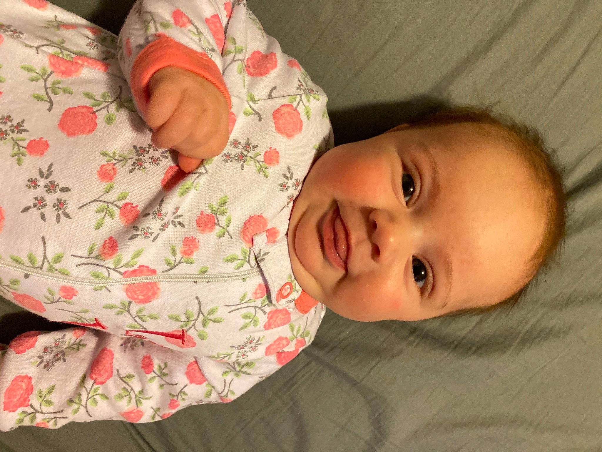 Sofia is registered to the contest to win money with this photo: baby, baby_toddler_clothing, cheek, chin, dress, eye, face, facial_expression, finger, hand, head, human_body, lip, mouth, nose, person, skin, sleeve, smile, textile