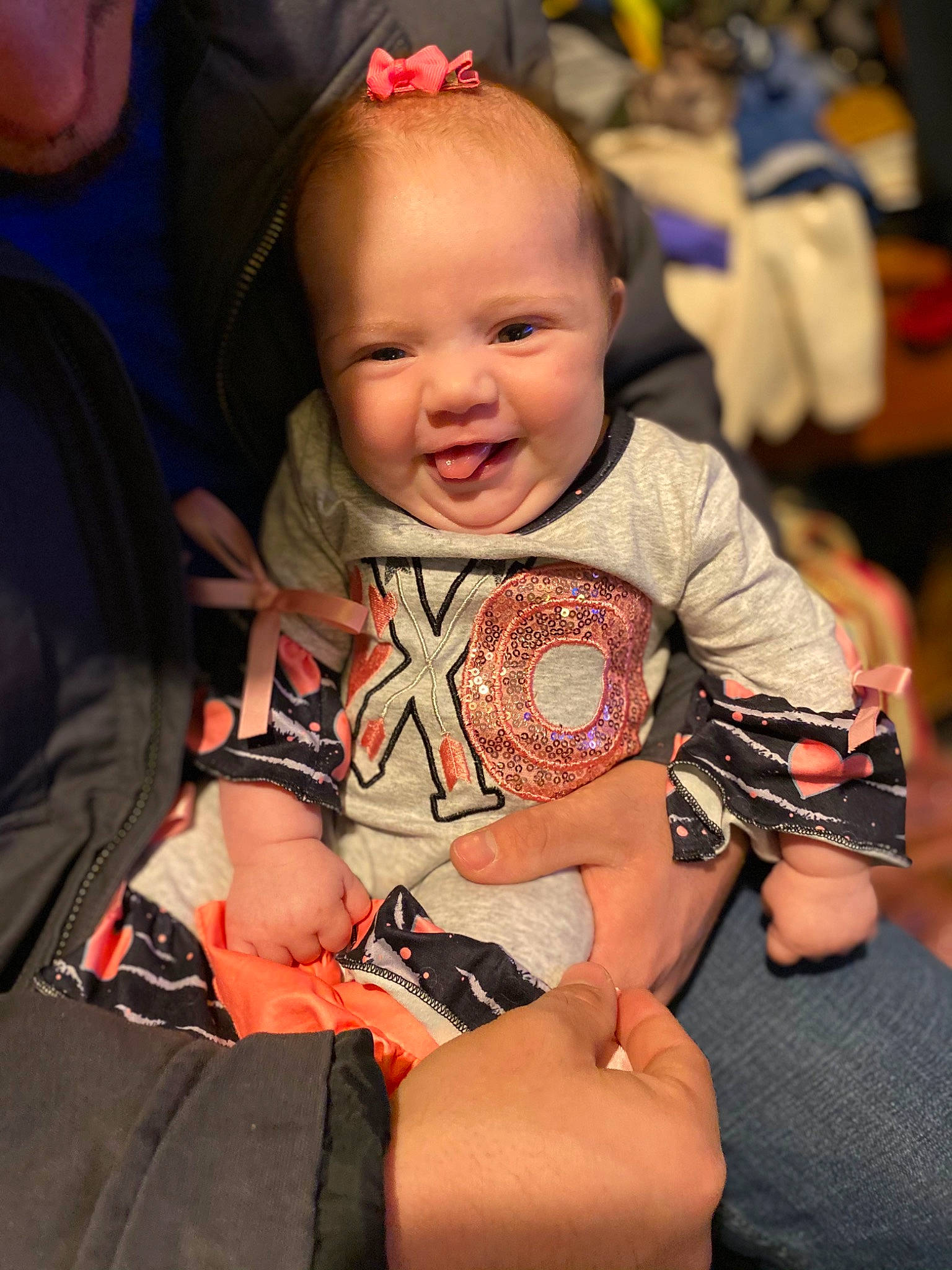 Sofia joined the competition — help win amazing prizes! baby, baby_toddler_clothing, cheek, child, comfort, event, eye, facial_expression, fun, happy, hat, iris, lap, orange, person, sitting, skin, sleeve, smile, thumb