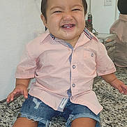 Wayne joined the competition — help win amazing prizes! toddler, child, smiling, shirt, denim_shorts, shoes, countertop, bathroom, mirror, reflection, granite, cabinet, happy, cute, indoor, person, short_sleeve, casual_clothing, young_child, sitting