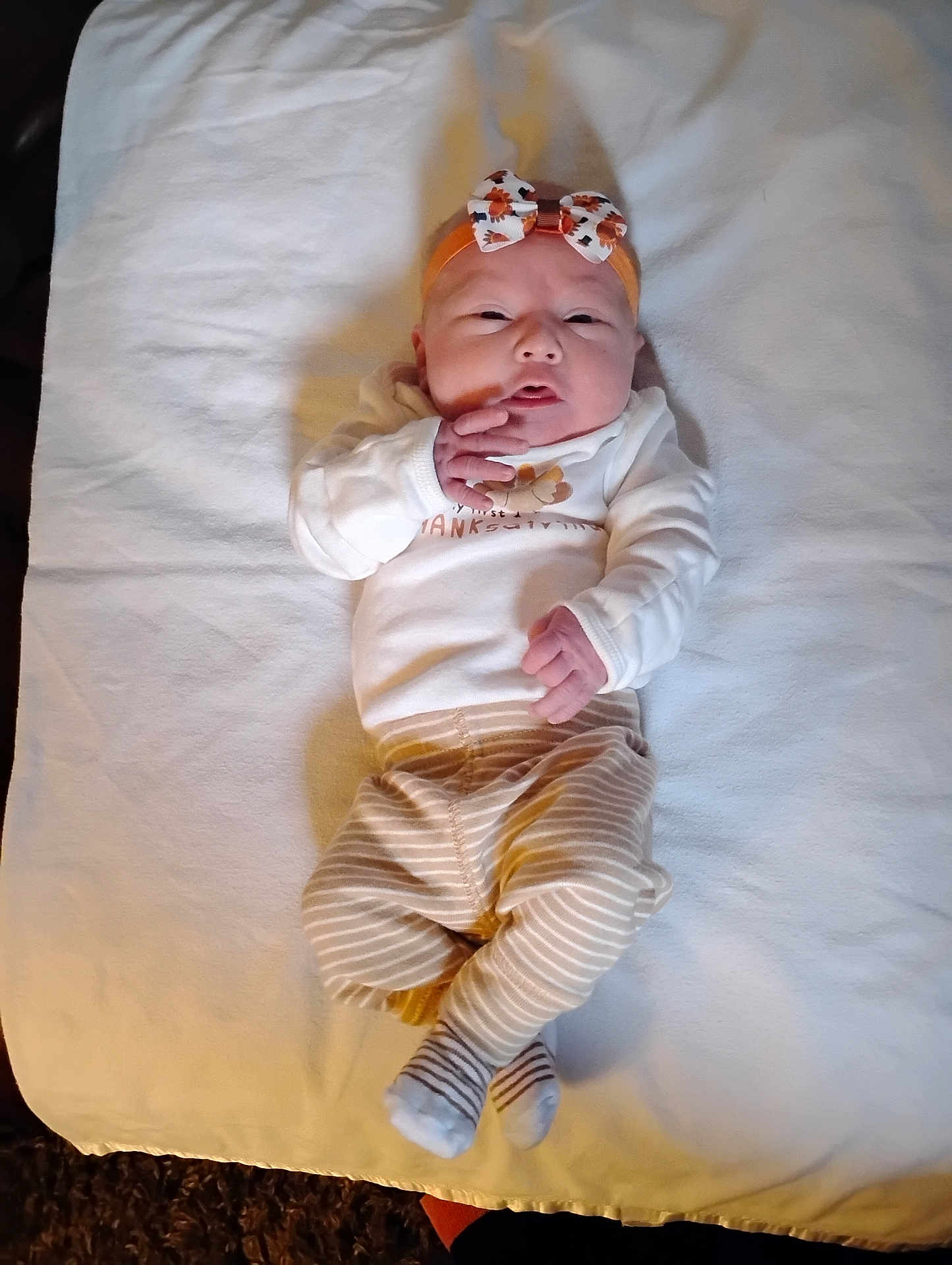 Phoenix joined the competition — help win amazing prizes! baby, bed, blanket, bodypart, bonnet, clothing, couch, crib, face, finger, furniture, hand, hat, head, infantbed, newborn, person, photography, portrait, wood