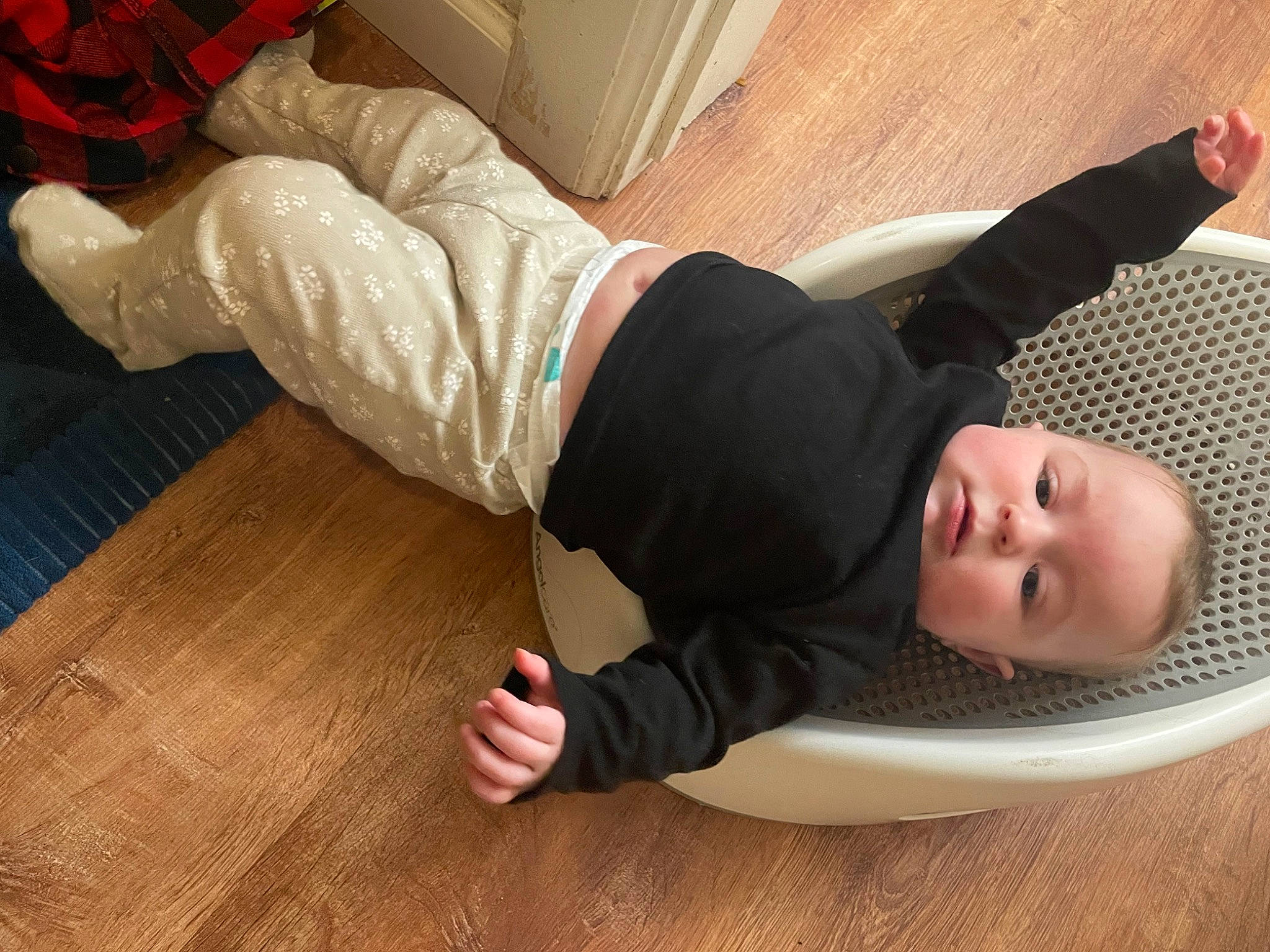 Alaynna joined the competition — help win amazing prizes! baby_toddler_clothing, comfort, elbow, finger, floor, flooring, foot, gesture, hardwood, human_body, joint, knee, person, sleeve, sock, sportswear, thigh, thumb, toddler, wood