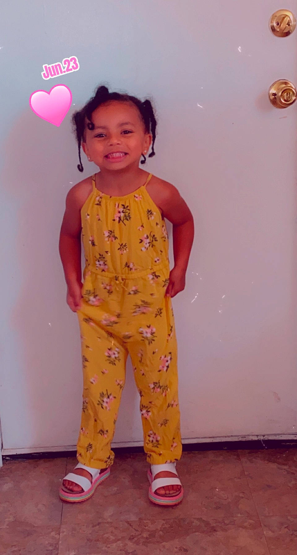 Amoura is registered to the contest to win money with this photo: arm, beauty, child, face, facial_expression, fashion, fashion_design, flooring, fun, hairstyle, happy, joy, magenta, orange, person, pink, shoulder, skin, sleeve, smile