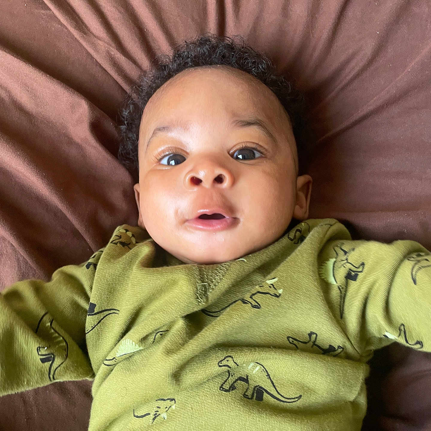 Taurus is registered to the contest to win money with this photo: baby, babylaughing, blackhair, blanket, bodypart, clothing, cushion, face, hair, happy, head, homedecor, newborn, person, photography, portrait, selfie, sleeve, smile, yawning