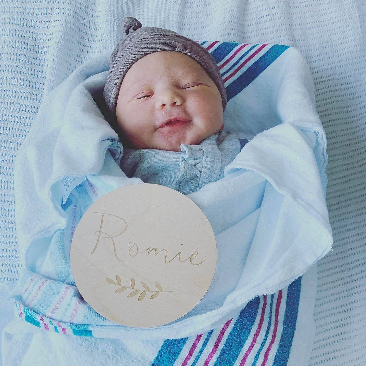 Romie participe au concours pour gagner de l'argent avec cette photo : baby, baby_products, baby_sleeping, baby_toddler_clothing, bedtime, child, comfort, face, font, handwriting, headwear, linens, pattern, person, pink, portrait_photography, sleep, smile, textile, toddler