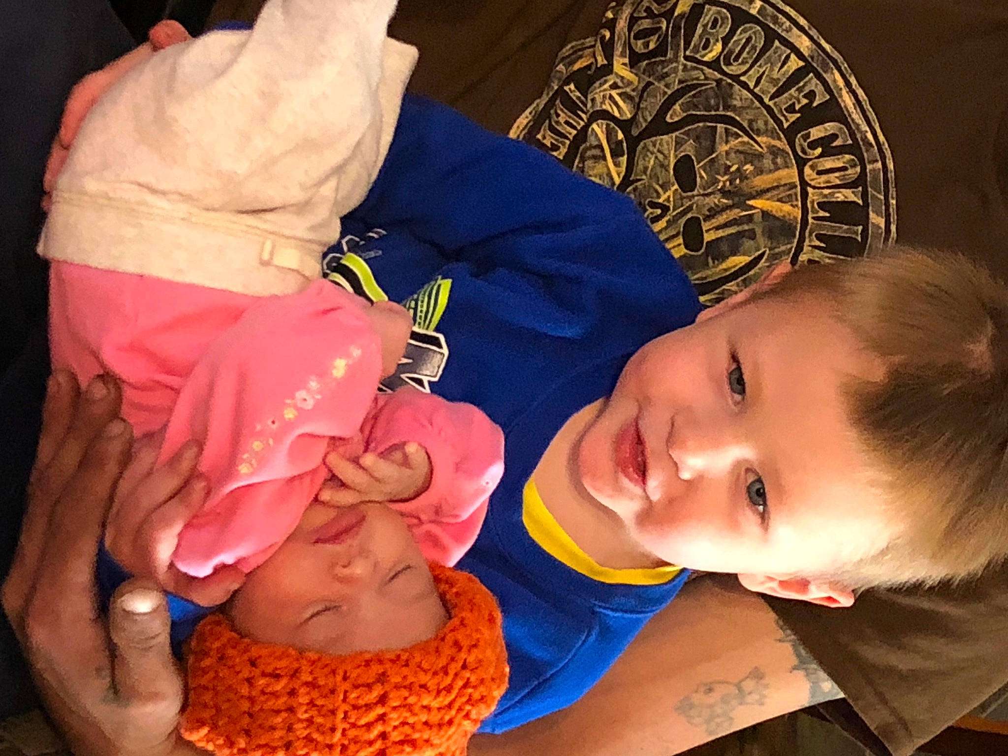 Elijah joined the competition — help win amazing prizes! baby, baby_toddler_clothing, cheek, facial_expression, fun, hairstyle, happy, headwear, human, joy, mammal, mouth, neck, nose, orange, organ, people, person, product, skin