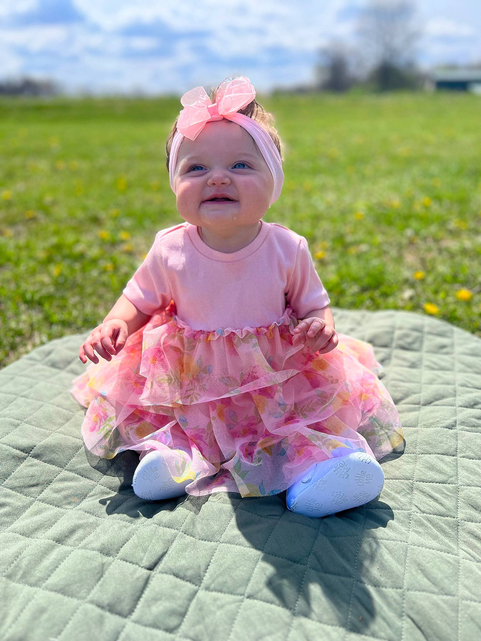 Quinnlee joined the competition — help win amazing prizes! baby, baby_toddler_clothing, child, face, fun, grass, grassland, happy, hat, headwear, joy, leisure, people_in_nature, person, pink, plant, recreation, skin, sky, smile