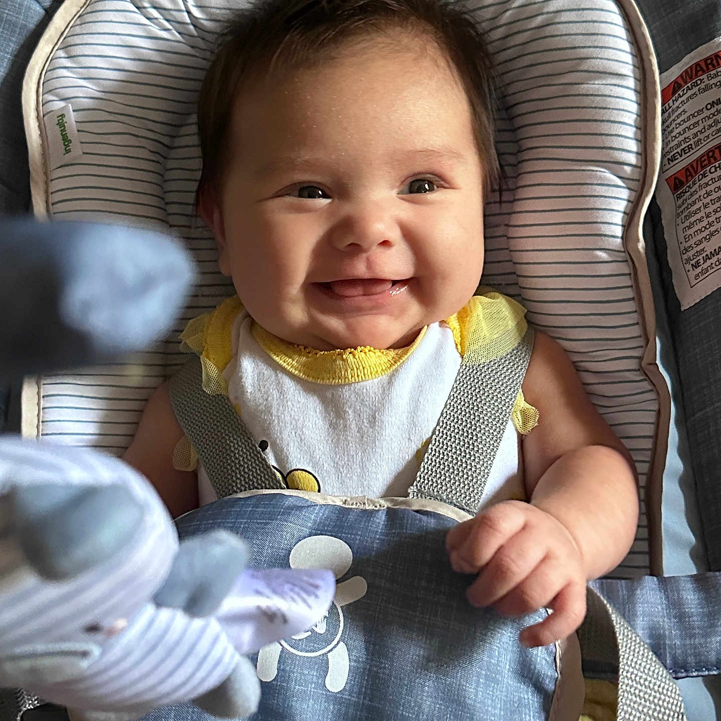 Kayslee is registered to the contest to win money with this photo: baby, babylaughing, bib, bodypart, clothing, cushion, face, finger, furniture, happy, head, homedecor, jeans, laughing, newborn, pants, person, photography, portrait, smile